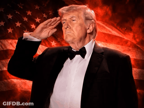 Man In Suit And Tie Standing In Crowd GIF