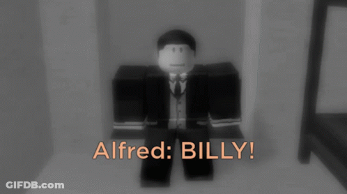 Man In Suit And Tie Standing In Darkness GIF