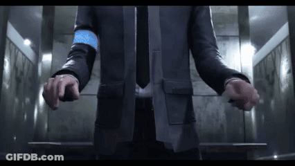 Man In Suit And Tie Standing In Elevator GIF