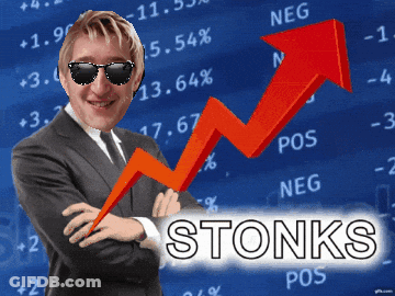 Man In Suit And Tie Standing In Front Of Stock Chart GIF