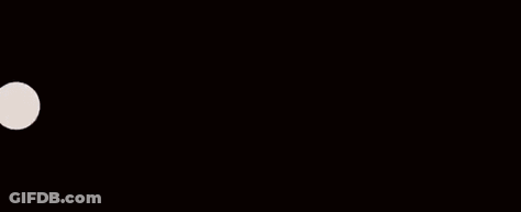 Man In Suit And Tie Standing In Gun Barrel GIF