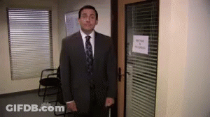 Man In Suit And Tie Standing GIF