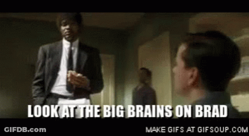 Man In Suit And Tie Standing Next To Another Man GIF