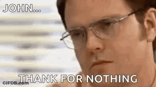 Man In Suit And Tie Standing On Sidewalk Saying Nothing GIF