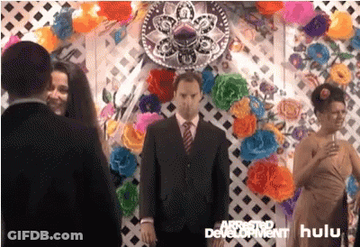 Man In Suit And Tie Standing GIF