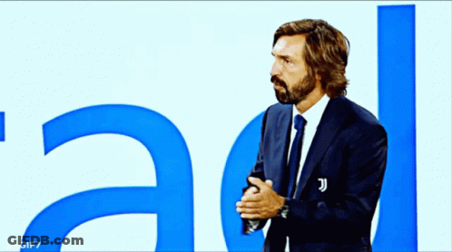Man In Suit And Tie Standing GIF