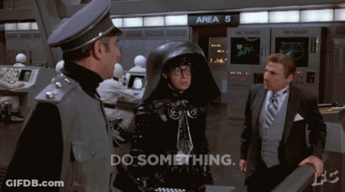 Man In Suit And Tie Standing GIF