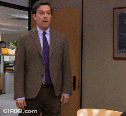 Man In Suit And Tie Standing GIF
