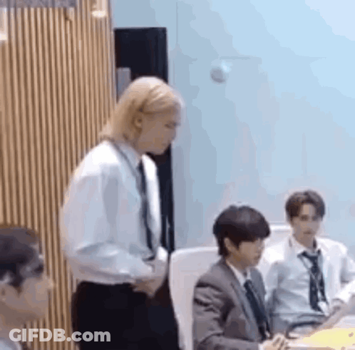 Man In Suit And Tie Standing GIF