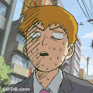 Man In Suit And Tie Sweating GIF