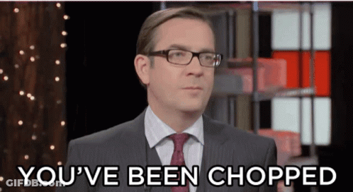 Man In Suit And Tie Talking About Being Chopped GIF