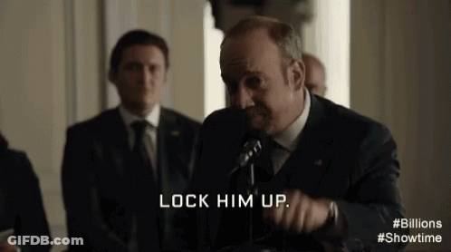 Man In Suit And Tie Talking Into Microphone GIF