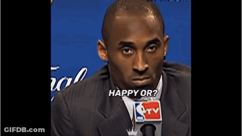 Man In Suit And Tie Talking Into NBA TV Microphone GIF