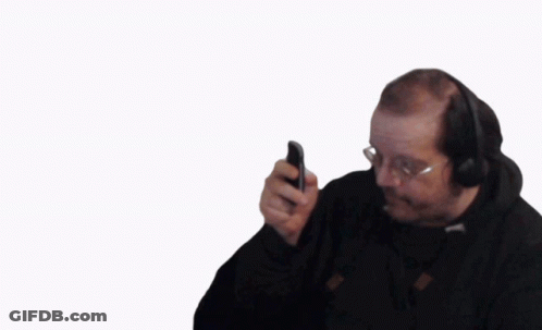 Man In Suit And Tie Talking On Cell Phone GIF
