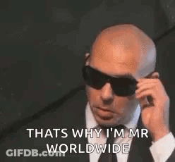 Man In Suit And Tie Talking On Phone GIF