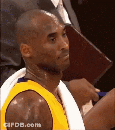Man In Suit And Tie Talking On TV Show GIF