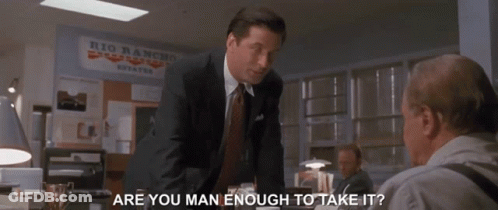 Man In Suit And Tie Talking To Another Man In Front Of Rio Rancho Sign GIF