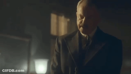 Man In Suit And Tie Talking To Churchill GIF