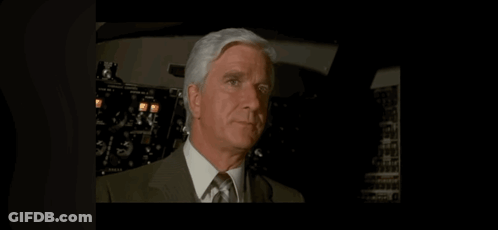 Man In Suit And Tie Talking To Shirley GIF