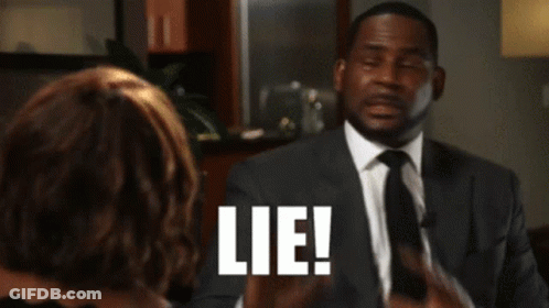 Man In Suit And Tie Talking To Woman Lie GIF
