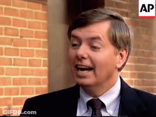 Man In Suit And Tie Talking GIF