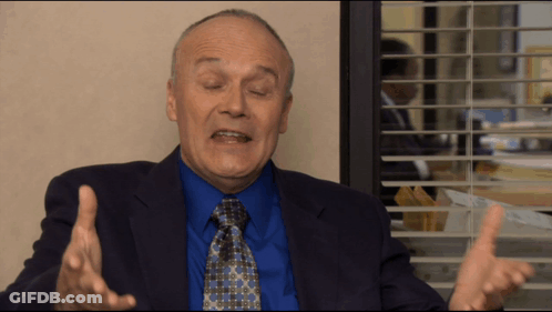 Man In Suit And Tie Talking GIF
