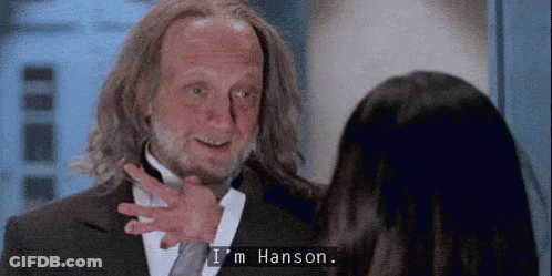 Man In Suit And Tie Tells Woman I'm Hanson GIF