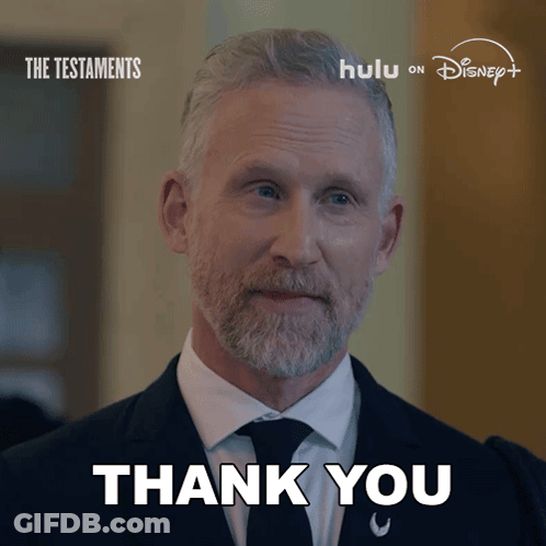 Man In Suit And Tie Thanking GIF