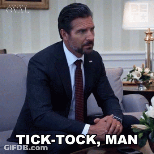 Man In Suit And Tie Tick-Tock Man GIF