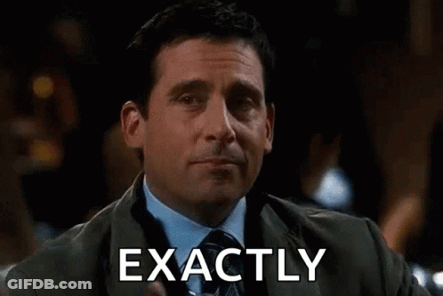 Man In Suit And Tie Toasting With Drink GIF