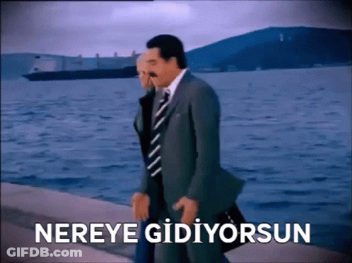 Man In Suit And Tie Walking By Water Nereye Gidiyorsun GIF
