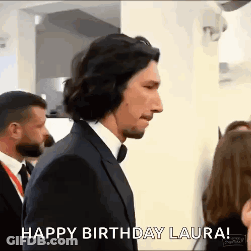 Man In Suit And Tie Walking In Crowd GIF