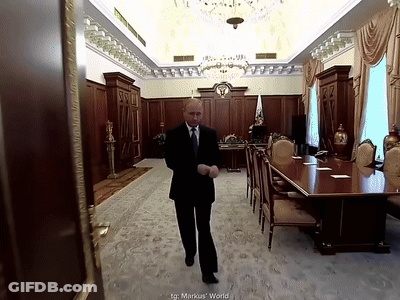 Man In Suit And Tie Walking Markus' World GIF