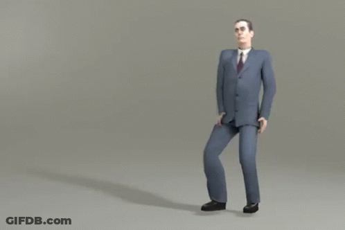Man In Suit And Tie Walking GIF