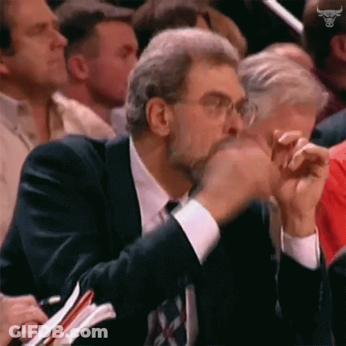 Man In Suit And Tie Watching Basketball Game GIF