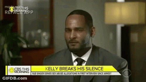 Man In Suit And Tie Watching CBS News GIF