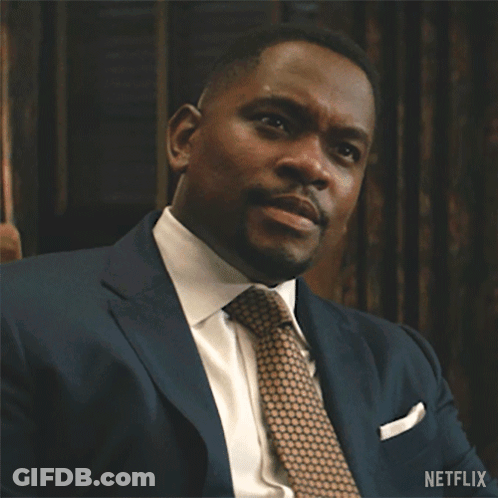 Man In Suit And Tie Waving Netflix GIF