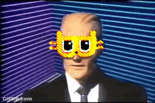 Man In Suit And Tie Wearing Cat Mask GIF