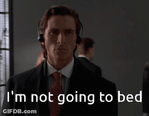 Man In Suit And Tie Wearing Headphones GIF