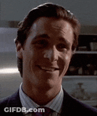 Man In Suit And Tie Wearing Headset GIF