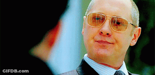Man In Suit And Tie Wearing Sunglasses GIF
