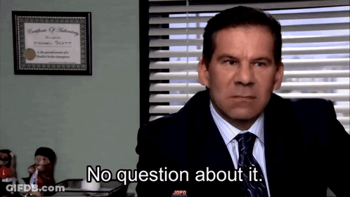Man In Suit And Tie Wearing Sunglasses Making Gesture GIF