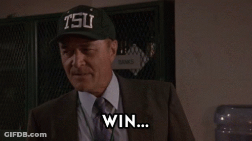 Man In Suit And Tie Wearing Tsu Hat GIF