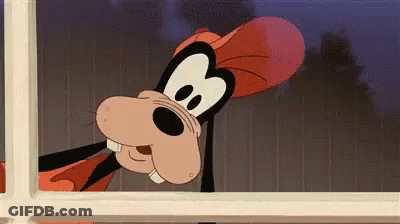 Man In Suit And Tie With 9000 Sign GIF