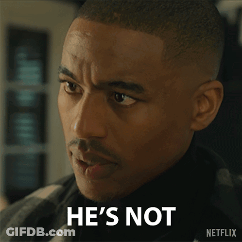 Man In Suit And Tie With America Is Back Sign GIF