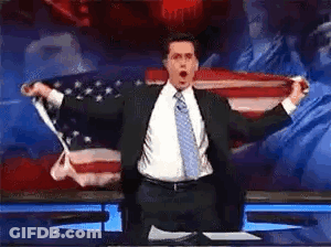 Man In Suit And Tie With American Flag GIF