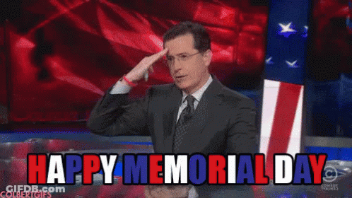 Man In Suit And Tie With American Flag Saying Happy Memorial Day GIF