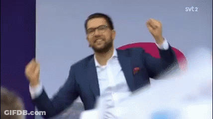 Man In Suit And Tie With Arms Outstretched GIF