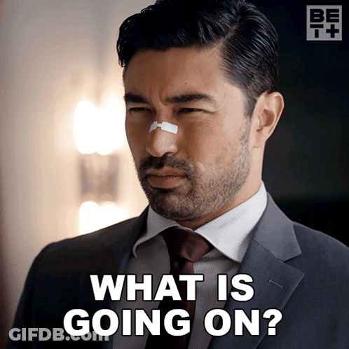 Man In Suit And Tie With Bandage On Nose GIF