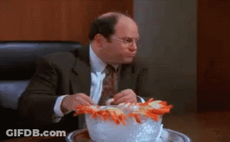 Man In Suit And Tie With Bowl Of Shrimp GIF